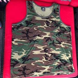 Four tank top bundle. 3 extra larges, and one XXL. Small stains on XXL and 1 XL